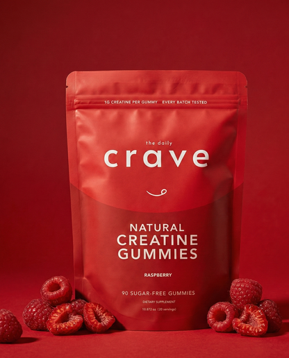 Red package of 'the daily crave' natural creatine gummies with raspberries on a red background